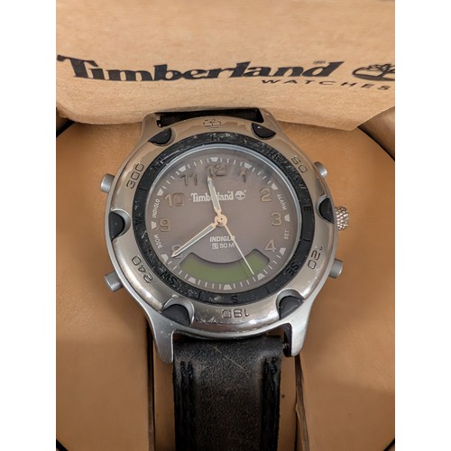 338 - Two Wristwatches Including a Timberland Analog-Digital Compass Watch and an Accurist Mechanical Ladi... 
