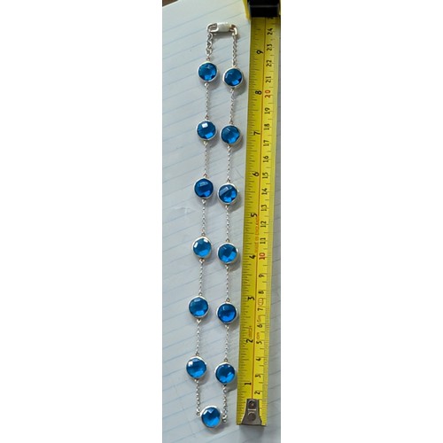 353 - 925 Sterling Silver and Blue Faceted Gemstone 19