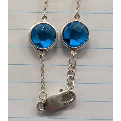 353 - 925 Sterling Silver and Blue Faceted Gemstone 19