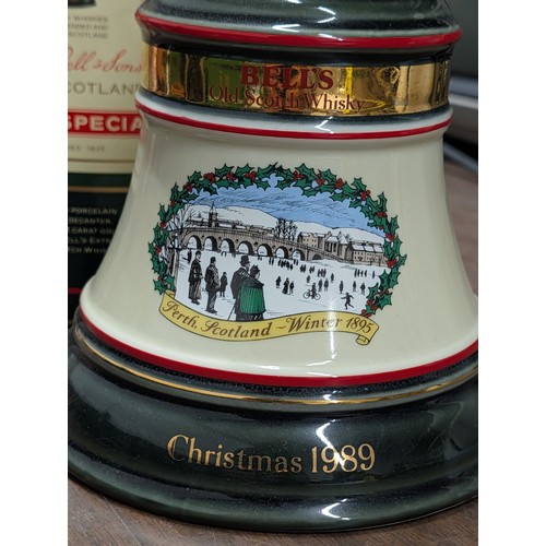 1344 - Unopened Bell's Old Scotch Whisky Christmas 1989 Decanter and 1988 Presentation Canister