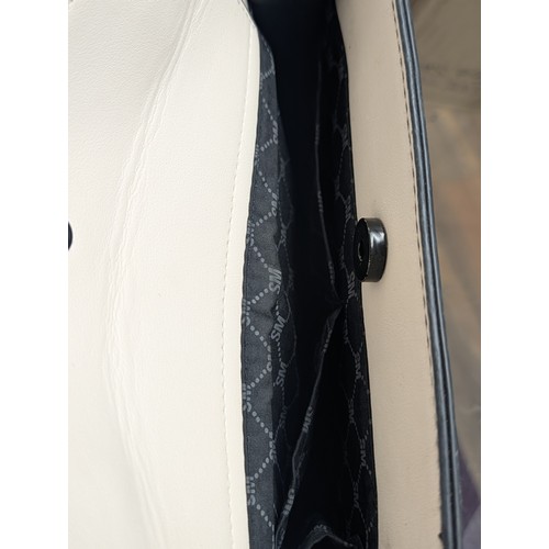 26 - Genuine Steve Madden Bevelyn Two-Tone Crossbody bag