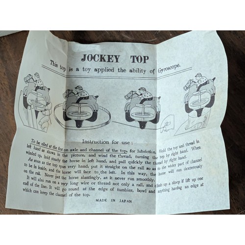 15 - A Pair of Vintage Mechanical Toys comprising an Ice Cream Vender MS 408 and a Jockey Top Gyroscope