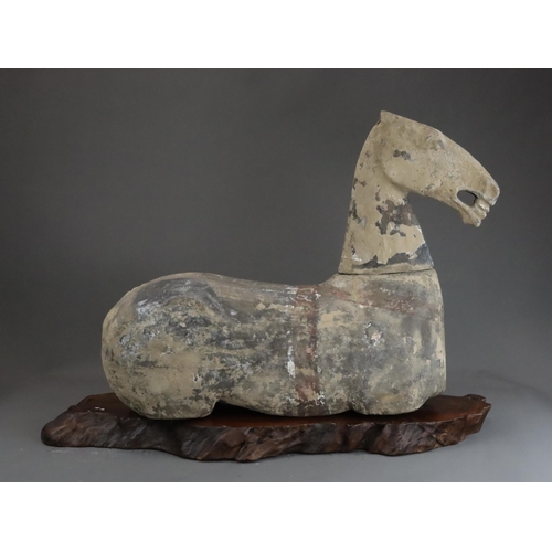 1 - A Painted Pottery Horse with wood stand, Han dynasty modelled recumbent with separate head and apert... 