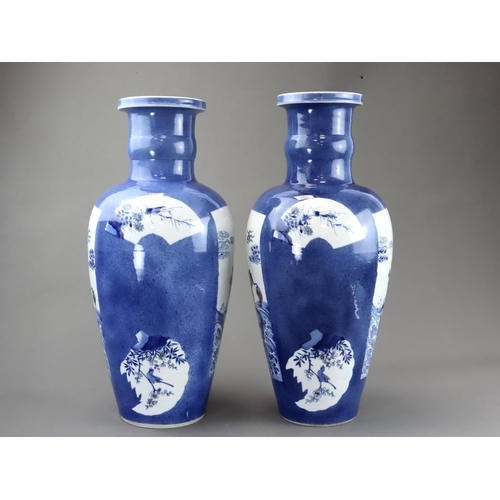 102 - A large Pair of Underglaze Red and Blue decorated Vases, Kangxi, each of tall ovoid form, the should... 