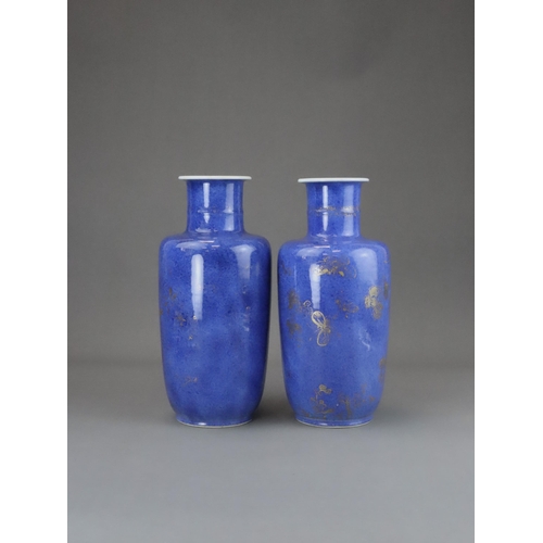 103 - An Attractive Pair of 'bleu souffle' Rouleau Vases, Kangxi, decorated on the exterior with gilt bird... 