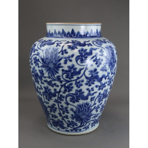 104 - A Blue and White Lotus Scroll Jar, Kangxi, the baluster sides sides well painted in rich soft blue w... 