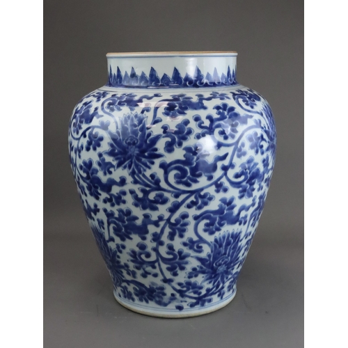 104 - A Blue and White Lotus Scroll Jar, Kangxi, the baluster sides sides well painted in rich soft blue w... 