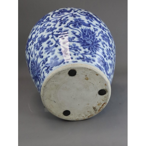 104 - A Blue and White Lotus Scroll Jar, Kangxi, the baluster sides sides well painted in rich soft blue w... 