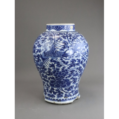 105 - A Blue and White Phoenix and Peony Vase, Kangxi of baluster shape,  painted to the sides in a contin... 