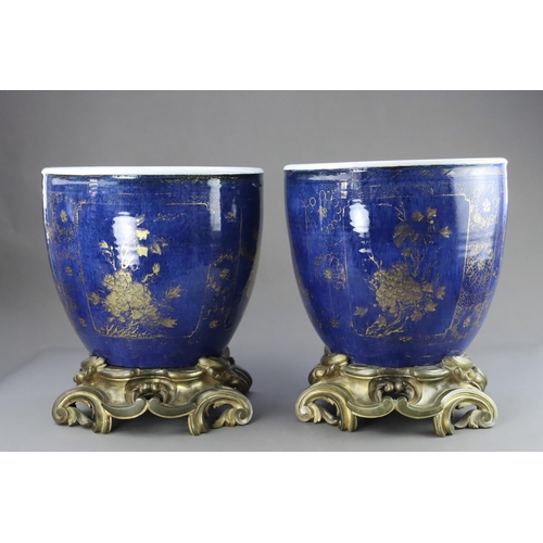 106 - An Attractive Gilt decorated Pair of 'bleu souffle' Jardinieres, Kangxi, later mounted in French orm... 