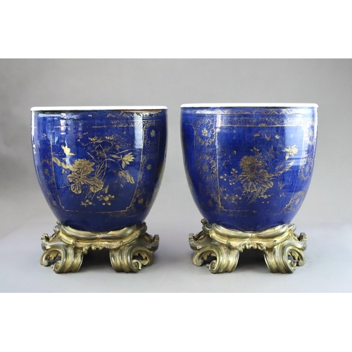 106 - An Attractive Gilt decorated Pair of 'bleu souffle' Jardinieres, Kangxi, later mounted in French orm... 