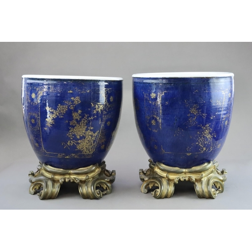 106 - An Attractive Gilt decorated Pair of 'bleu souffle' Jardinieres, Kangxi, later mounted in French orm... 