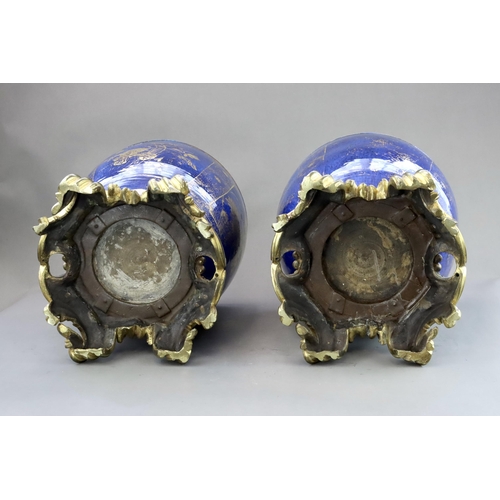 106 - An Attractive Gilt decorated Pair of 'bleu souffle' Jardinieres, Kangxi, later mounted in French orm... 