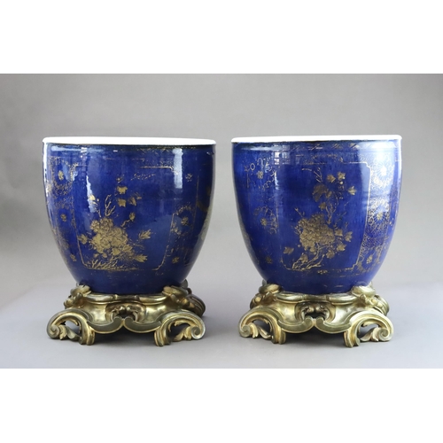 106 - An Attractive Gilt decorated Pair of 'bleu souffle' Jardinieres, Kangxi, later mounted in French orm... 