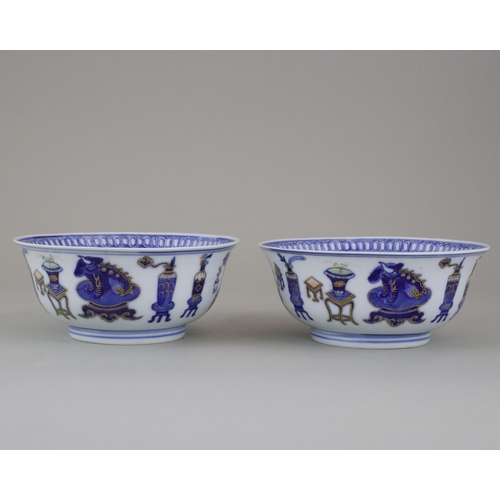 114 - A Pair of Blue and White 'Hundred Treasures' Bowls, six character Daoguang sealmark and of the perio... 