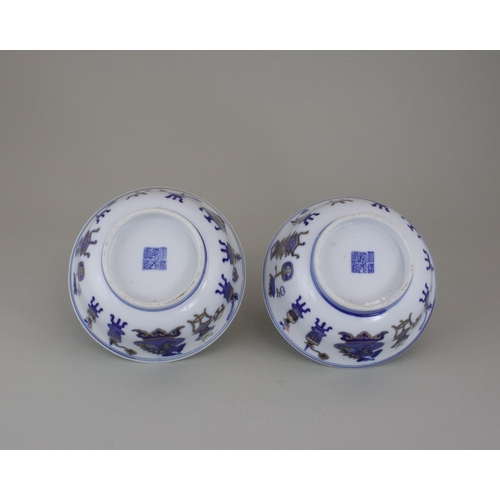 114 - A Pair of Blue and White 'Hundred Treasures' Bowls, six character Daoguang sealmark and of the perio... 