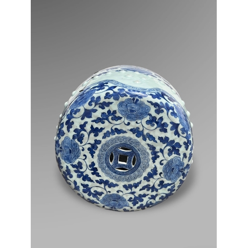 115 - A blue and white Garden Seat, 18th/19th century of barrel form, with 'cash' shaped piercings to top ... 