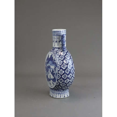 116 - A Blue and White Landscape Moonflask, Guangxu, well painted in strong blue on both sides with a cent... 