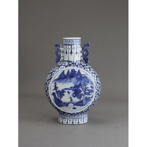 116 - A Blue and White Landscape Moonflask, Guangxu, well painted in strong blue on both sides with a cent... 