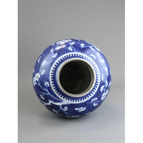 127 - A Blue and White Baluster Vase with Prunus, Kangxi the sides painted in deep tones with pendent flow... 