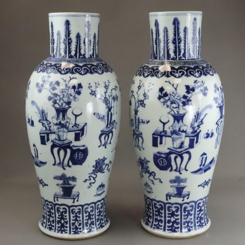 129 - A Large Pair of Blue and White 'Hundred Antiques' Vases, 19th century, Each tall baluster body decor... 