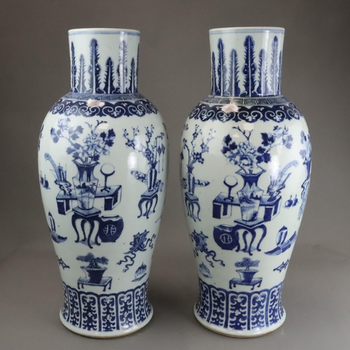 129 - A Large Pair of Blue and White 'Hundred Antiques' Vases, 19th century, Each tall baluster body decor... 