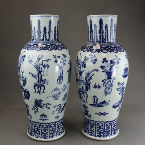 129 - A Large Pair of Blue and White 'Hundred Antiques' Vases, 19th century, Each tall baluster body decor... 