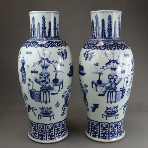 129 - A Large Pair of Blue and White 'Hundred Antiques' Vases, 19th century, Each tall baluster body decor... 