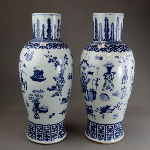 129 - A Large Pair of Blue and White 'Hundred Antiques' Vases, 19th century, Each tall baluster body decor... 