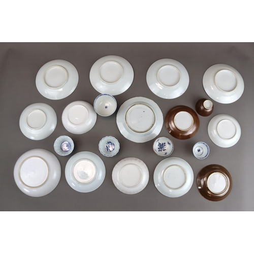 139 - A Set of 14 Saucers and 6 Cups, Kangxi and later 9 saucers with landscapes painted in blue and white... 