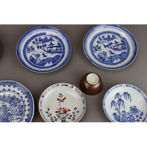 139 - A Set of 14 Saucers and 6 Cups, Kangxi and later 9 saucers with landscapes painted in blue and white... 