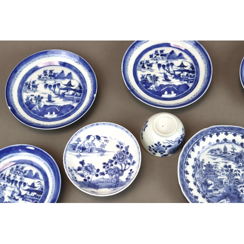 139 - A Set of 14 Saucers and 6 Cups, Kangxi and later 9 saucers with landscapes painted in blue and white... 