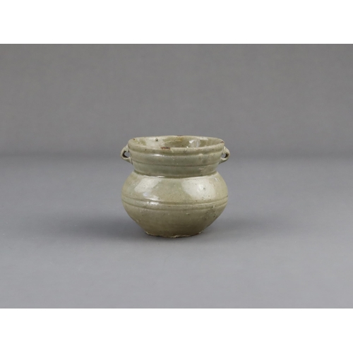 15 - A Yue Celadon-glazed Jar, Eastern Jin dynasty the tapered ovoid body rising to a splayed neck, two b... 