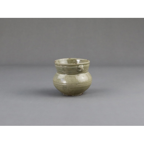 15 - A Yue Celadon-glazed Jar, Eastern Jin dynasty the tapered ovoid body rising to a splayed neck, two b... 