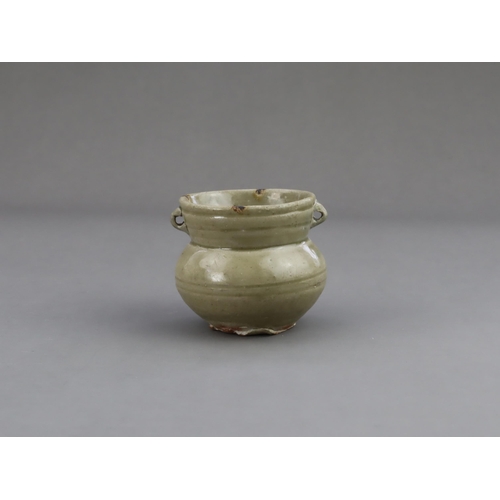 15 - A Yue Celadon-glazed Jar, Eastern Jin dynasty the tapered ovoid body rising to a splayed neck, two b... 