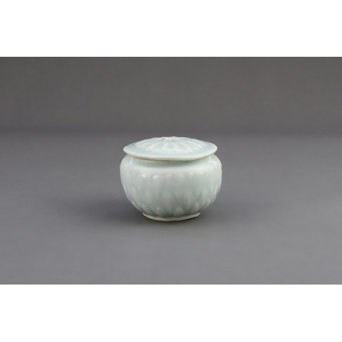 18 - A Qingbai Lotus Jar and Cover, Song dynasty the finely potted globular jar with three layers of carv... 