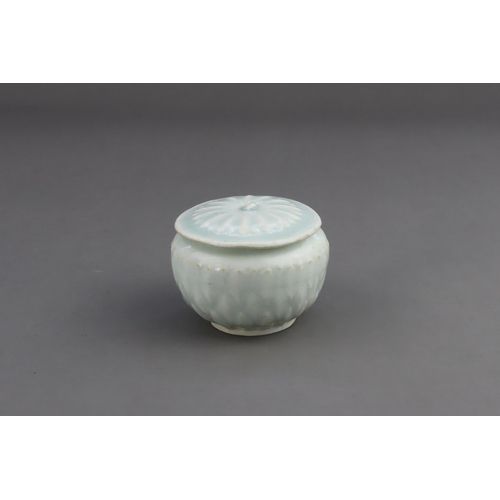 18 - A Qingbai Lotus Jar and Cover, Song dynasty the finely potted globular jar with three layers of carv... 