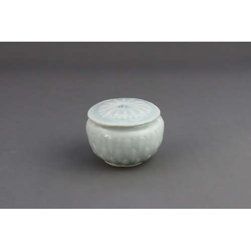 18 - A Qingbai Lotus Jar and Cover, Song dynasty the finely potted globular jar with three layers of carv... 