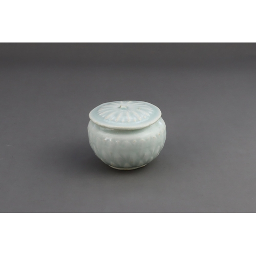 18 - A Qingbai Lotus Jar and Cover, Song dynasty the finely potted globular jar with three layers of carv... 