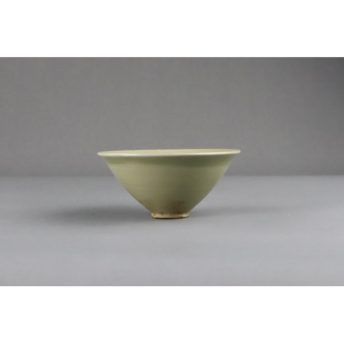 25 - A Fine Yaozhou Celadon Conical Bowl, Song dynasty of conical shape, thinly-potted from the short str... 