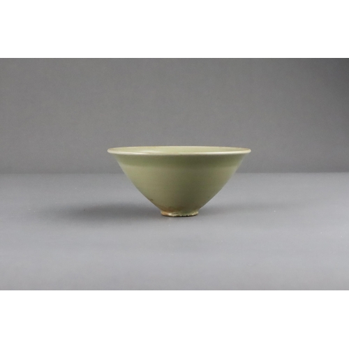 25 - A Fine Yaozhou Celadon Conical Bowl, Song dynasty of conical shape, thinly-potted from the short str... 