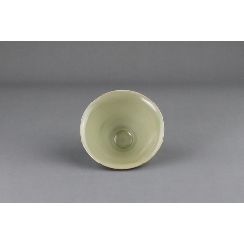 25 - A Fine Yaozhou Celadon Conical Bowl, Song dynasty of conical shape, thinly-potted from the short str... 