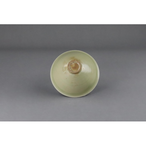 25 - A Fine Yaozhou Celadon Conical Bowl, Song dynasty of conical shape, thinly-potted from the short str... 