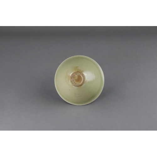 25 - A Fine Yaozhou Celadon Conical Bowl, Song dynasty of conical shape, thinly-potted from the short str... 