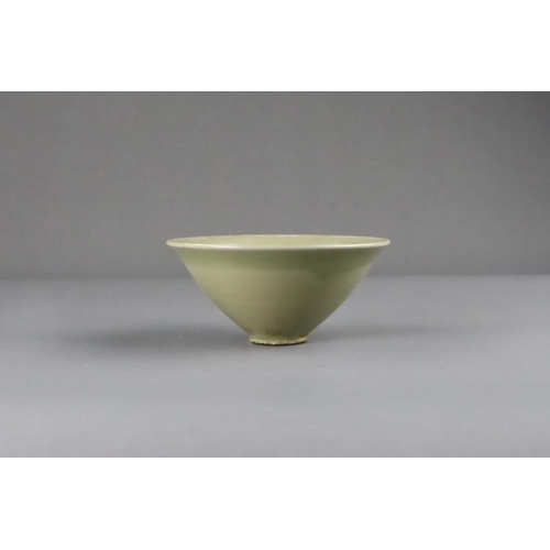 25 - A Fine Yaozhou Celadon Conical Bowl, Song dynasty of conical shape, thinly-potted from the short str... 