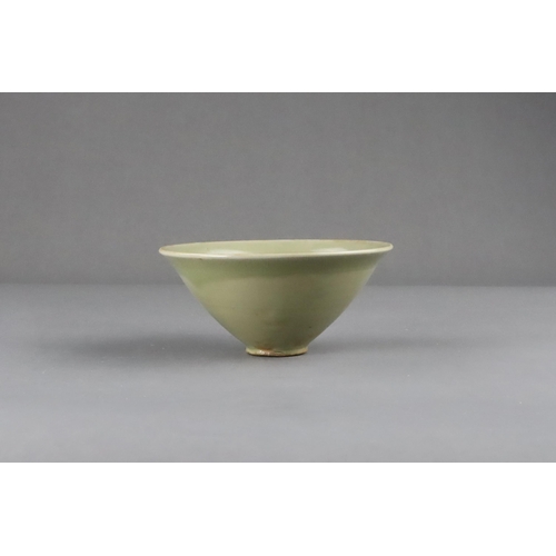 25 - A Fine Yaozhou Celadon Conical Bowl, Song dynasty of conical shape, thinly-potted from the short str... 