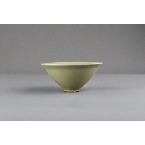 25 - A Fine Yaozhou Celadon Conical Bowl, Song dynasty of conical shape, thinly-potted from the short str... 