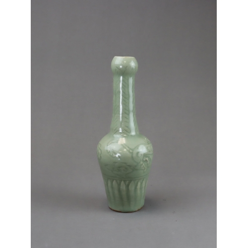 27 - A Rare Longquan Celadon Carved 'Tiger' Vase, Yuan dynasty of slender baluster form rising to the tal... 