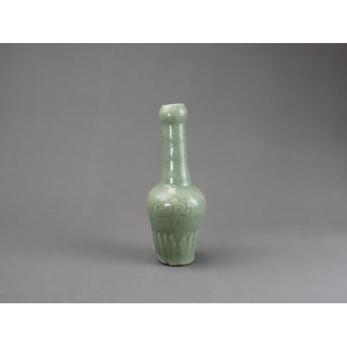 27 - A Rare Longquan Celadon Carved 'Tiger' Vase, Yuan dynasty of slender baluster form rising to the tal... 