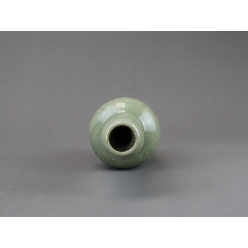 27 - A Rare Longquan Celadon Carved 'Tiger' Vase, Yuan dynasty of slender baluster form rising to the tal... 